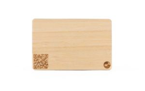 An NFC business card made out of bamboo material.